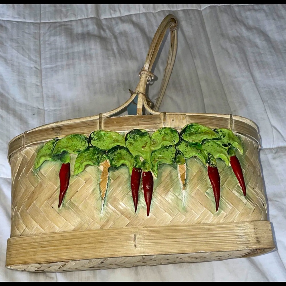 Antique folk art pepper basket. Missing two peppers from front.